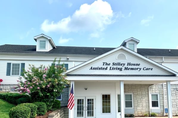 The front view of an assisted living memory care center building.