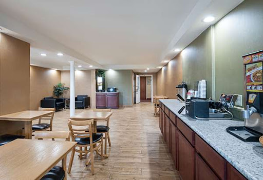 A cozy dining area with wooden furniture, providing a warm atmosphere.