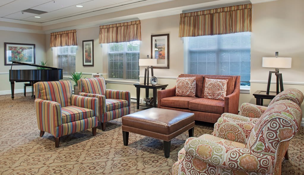 A cozy living room with comfortable seating and warm decor.