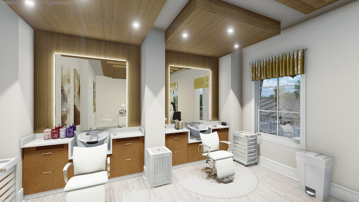 A modern salon interior with stylish mirrors and seating areas.