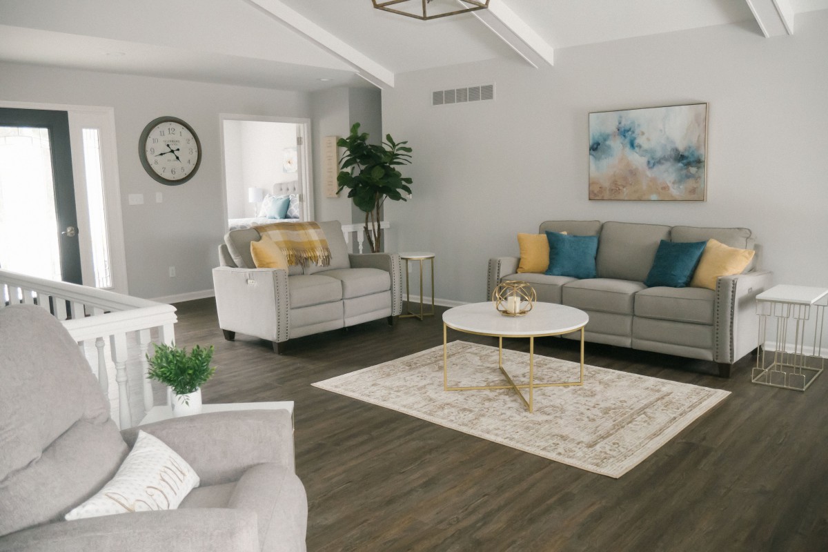 A stylish living room with modern furniture and cozy decor.