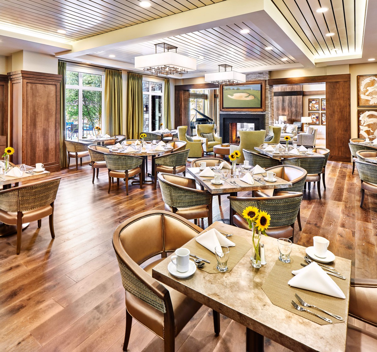 Elegantly designed restaurant interior with neatly arranged dining tables and chairs.