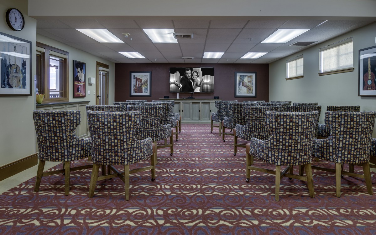 A well-arranged conference room with patterned chairs and elegant decor.