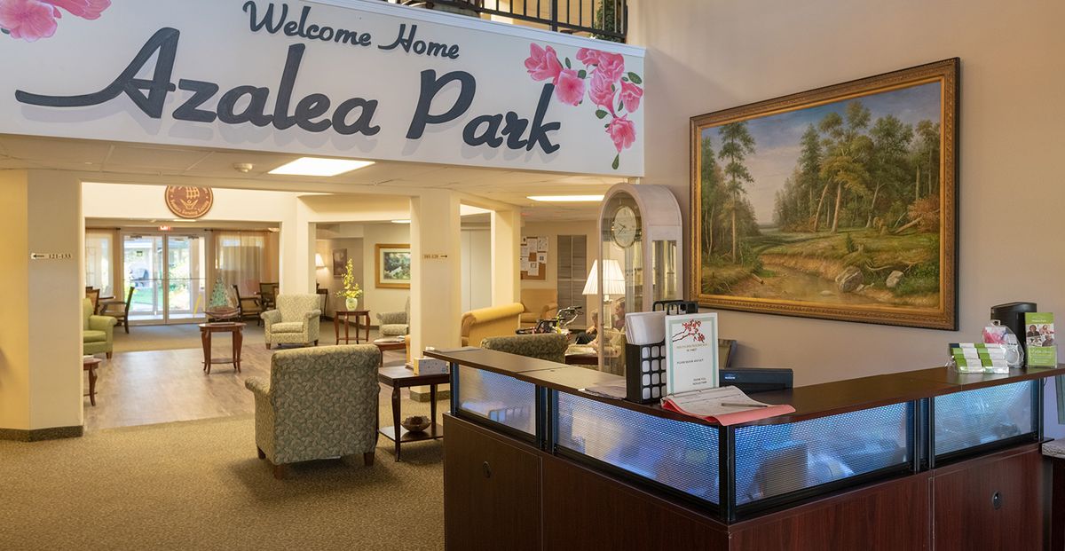 A welcoming reception area at Azalea Park with cozy seating and decorative elements.
