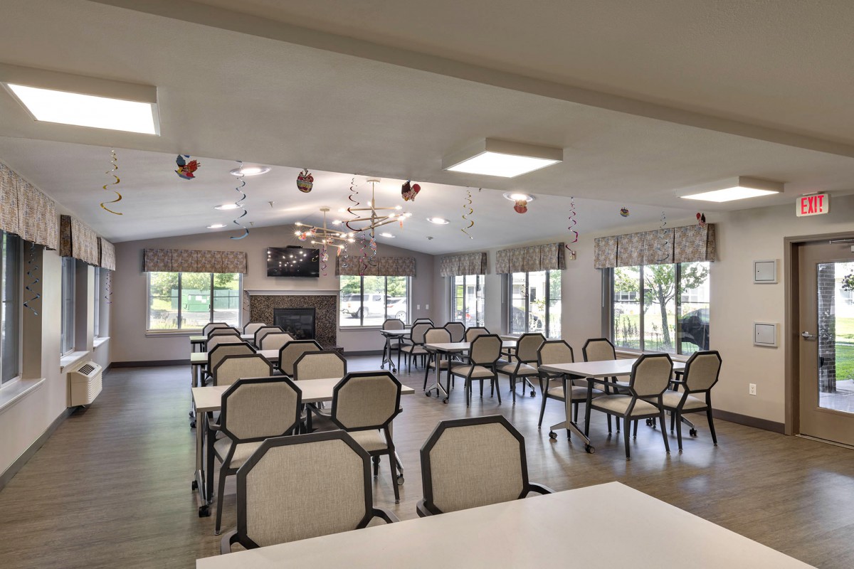 A spacious dining area with modern decor and ample seating arrangements.