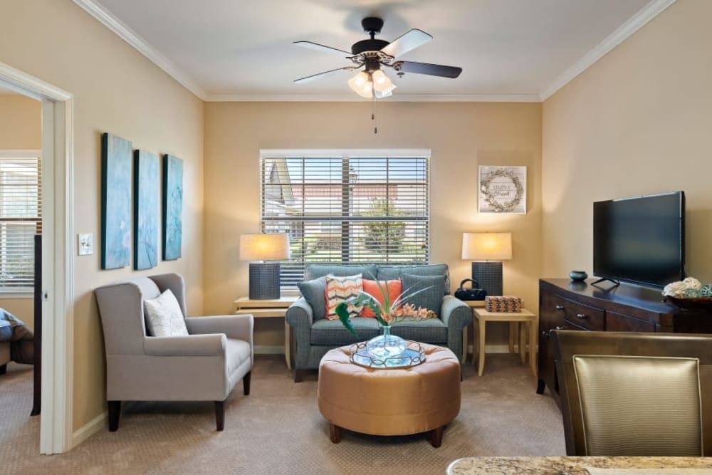 A cozy living room with stylish furniture and decor.