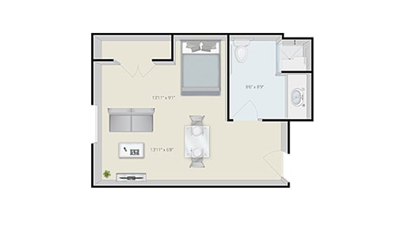 Studio apartment floor plan with designated living, kitchen, and bathroom areas.