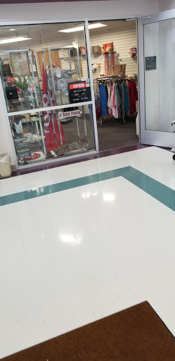 A polished floor inside a retail store, showcasing neat, tiled design.