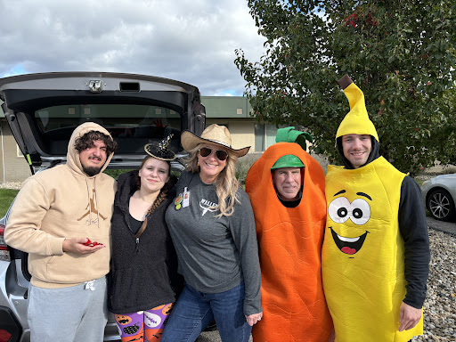 A playful gathering of friends in colorful costumes, ready to enjoy the day!