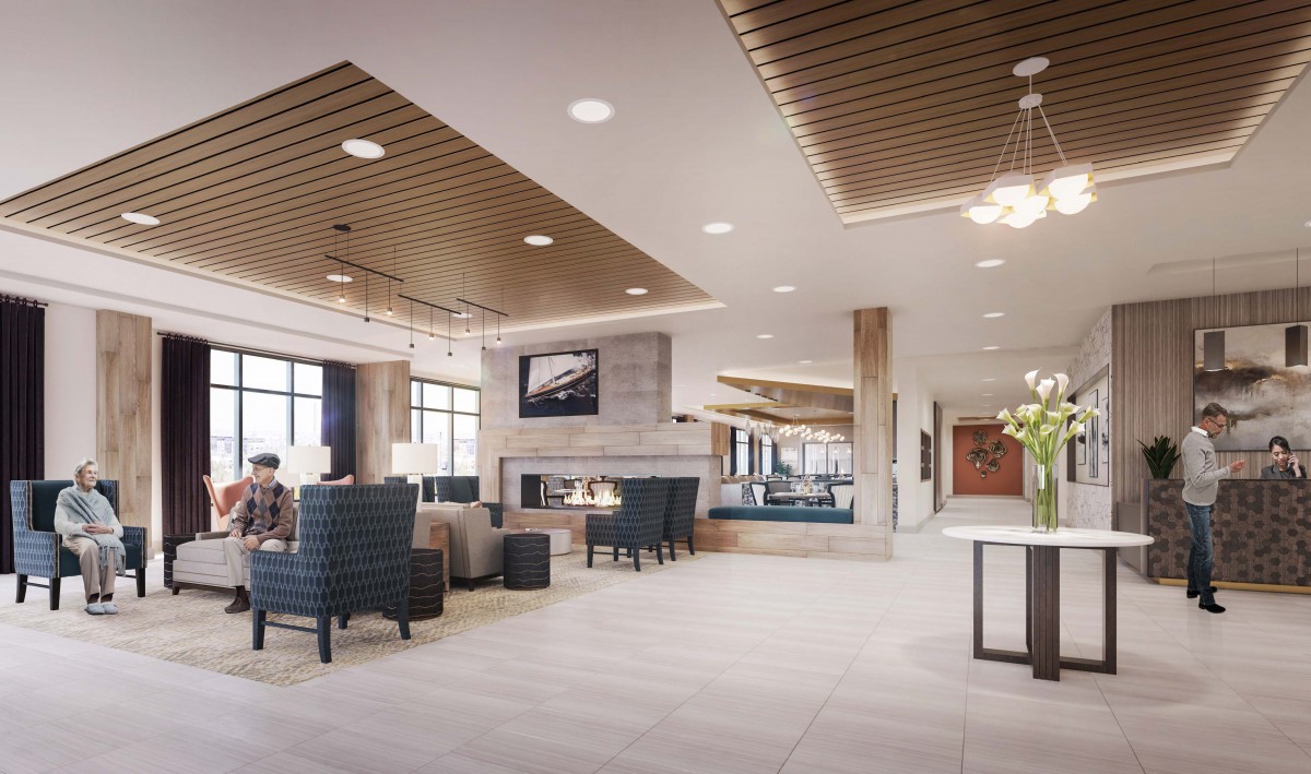 A modern lobby with comfortable seating, a fireplace, and ample natural light.