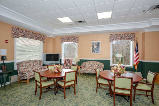 A cozy lounge area featuring comfortable seating and dining arrangements.