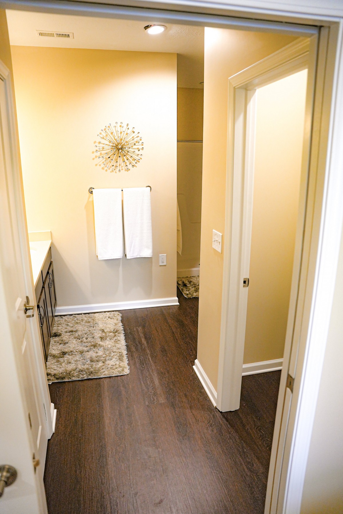 A contemporary bathroom with stylish decor and a clean design.