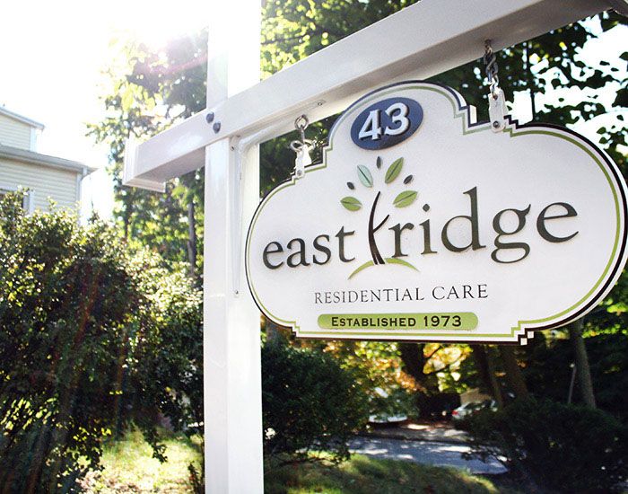 Sign for Eastridge Residential Care, established in 1973.
