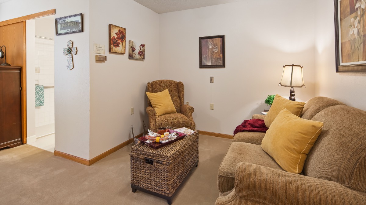 A cozy living room with comfortable seating and homey decor.