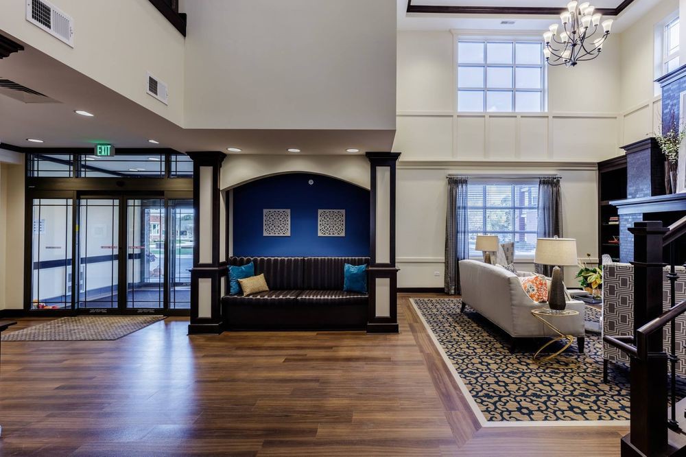 Elegant hotel lobby with modern decor and comfortable seating.