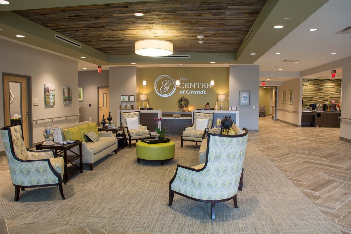 A modern lobby with comfortable seating and stylish decor in a reception area.