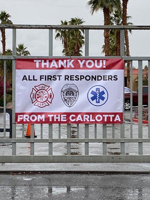 A banner expressing gratitude to first responders from The Carlotta.