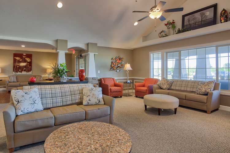 A spacious and cozy living room with comfortable seating and stylish decor.