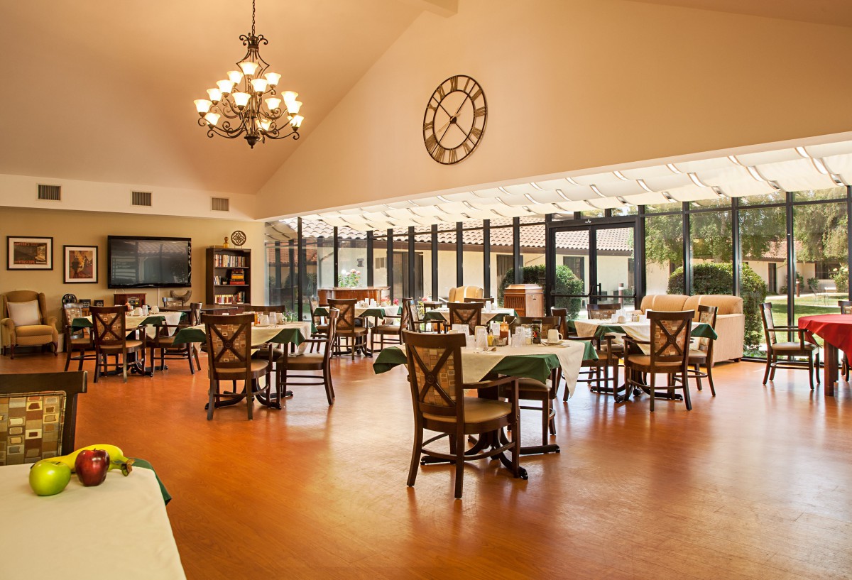 A spacious dining area with elegant decor and abundant natural light.