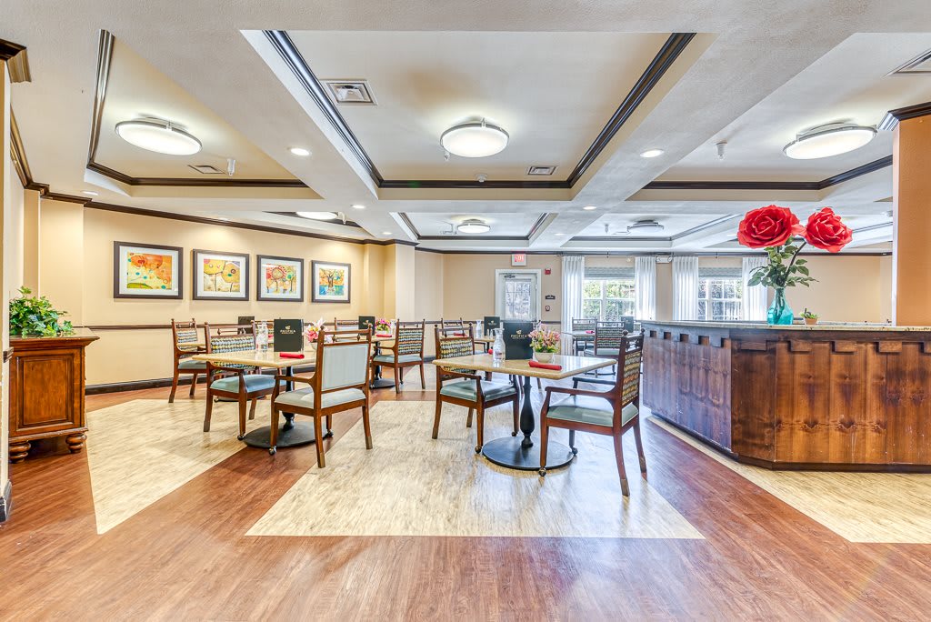 A modern restaurant dining area with stylish decor and comfortable seating.