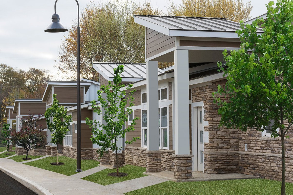 A row of modern suburban homes with well-maintained landscaping.
