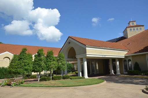 A beautiful architectural structure under a clear blue sky.
