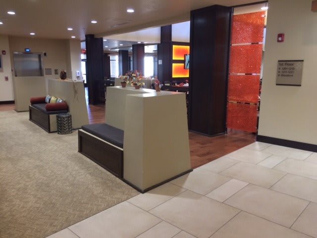 A modern hotel lobby with stylish seating and decor.