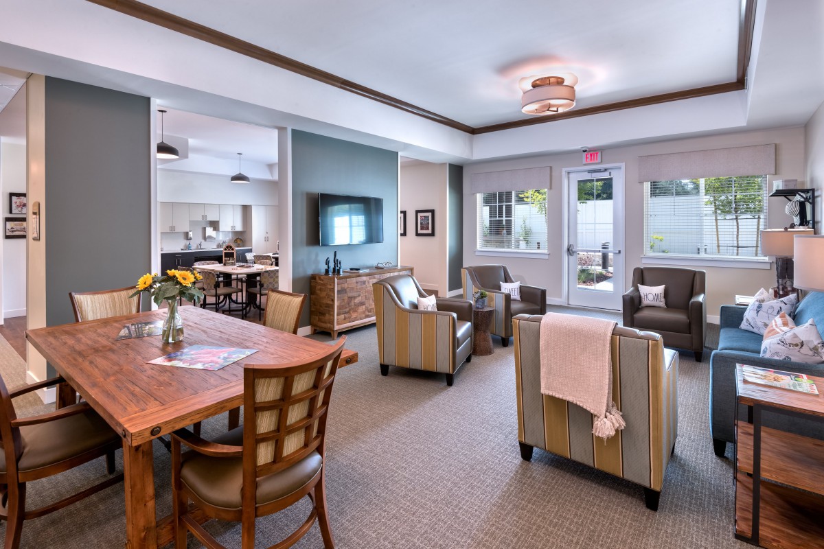 A modern living room with comfortable seating and stylish decor.