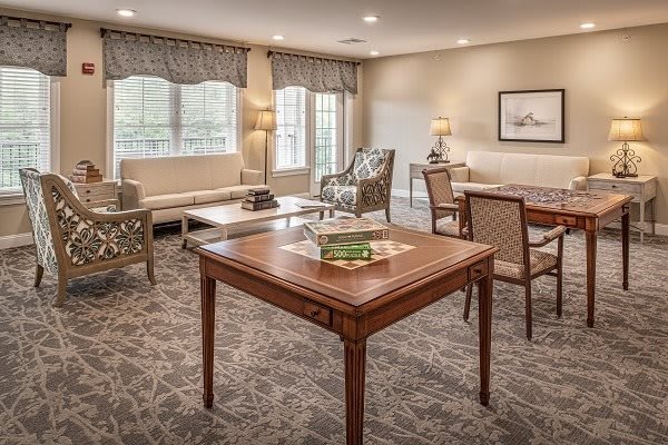 A cozy living room with elegant furniture and soft lighting.