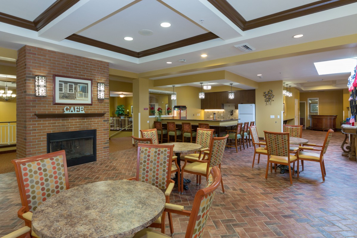 A cozy dining area with ample seating and warm lighting.