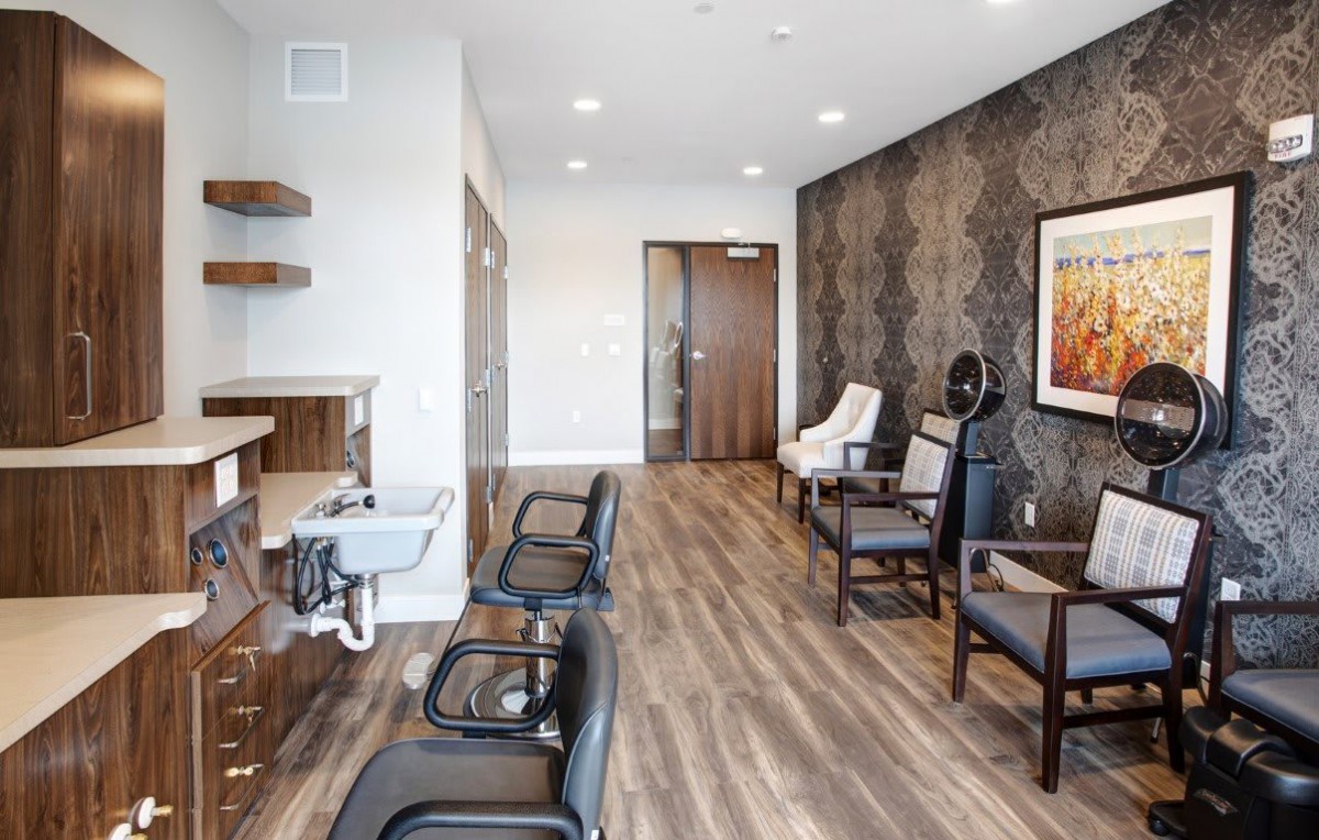 A modern waiting room with comfortable seating and stylish decor.