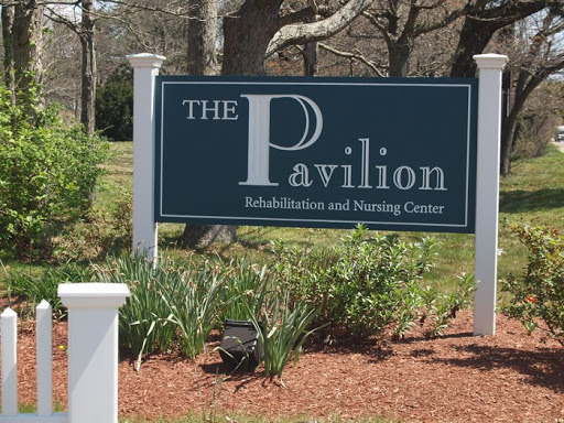 The Pavilion Rehabilitation and Nursing Center sign amidst a well-maintained landscape.