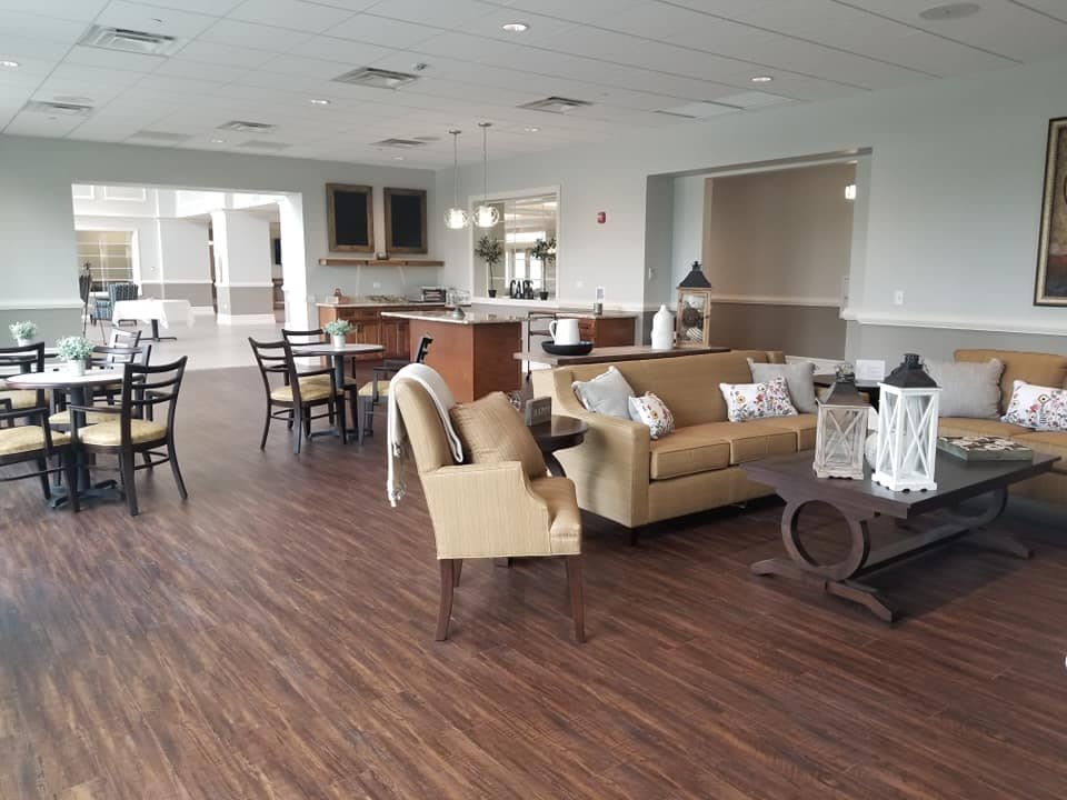 A spacious and elegantly decorated living area featuring comfortable seating and stylish furnishings.