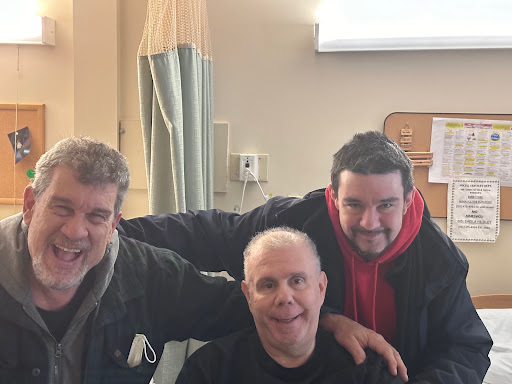 A heartfelt moment shared among friends at the hospital.