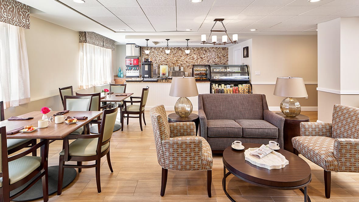 A cozy and modern lounge cafe with comfortable seating and a stylish decor.