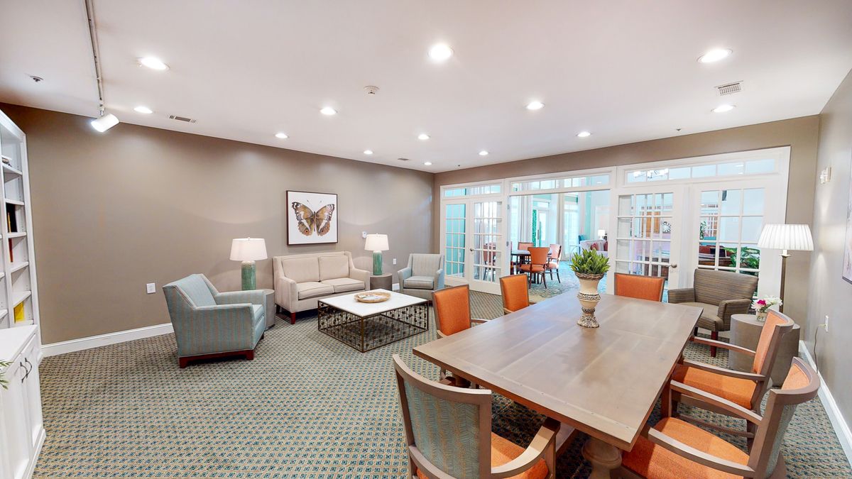A modern living room with comfortable seating and stylish decor.