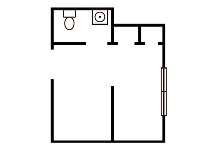 A simple floor plan showing the layout of a small apartment with a bathroom.