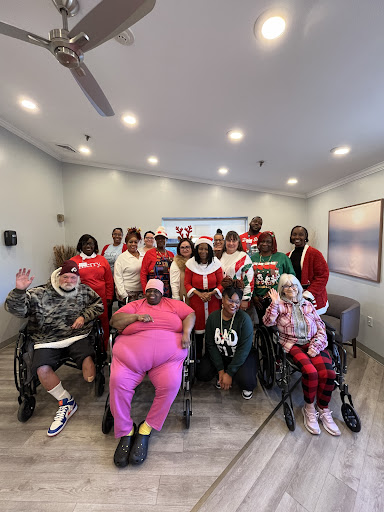A joyful holiday gathering with friends, celebrating in festive attire.