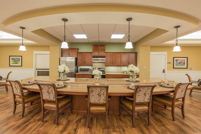 A spacious kitchen and dining area with modern appliances and elegant furnishings.