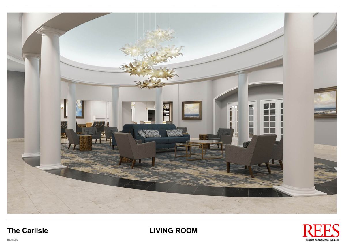 A luxurious and spacious living room with elegant furnishings.