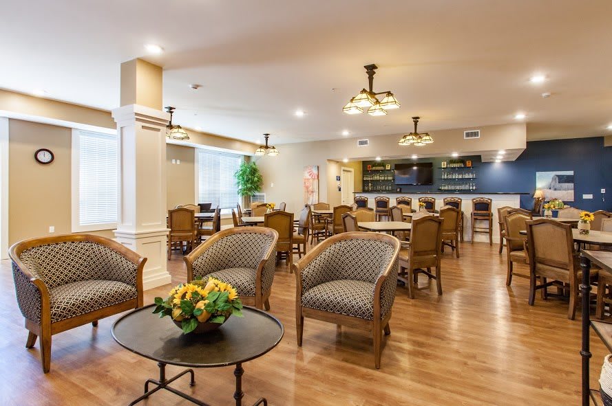 A well-furnished hotel lobby with comfortable seating and elegant decor.