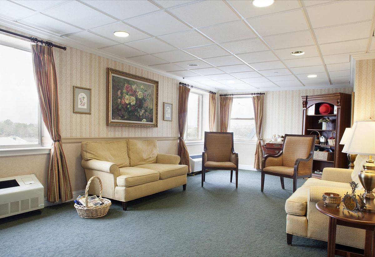 A cozy living room with comfortable seating and tasteful decor.
