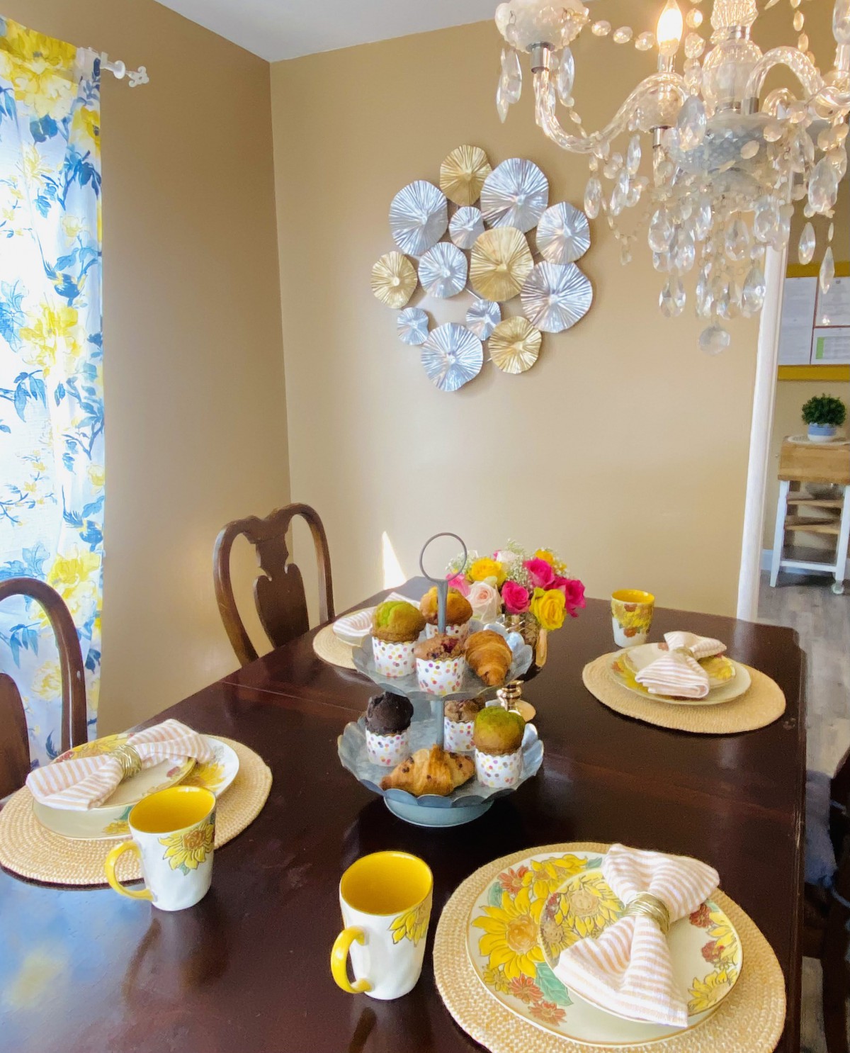 Elegant dining room with tasteful table settings and floral decorations.