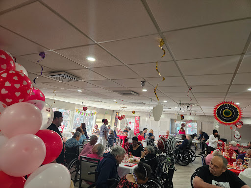 A lively celebration at a community center, filled with seniors enjoying the festive decorations and company.