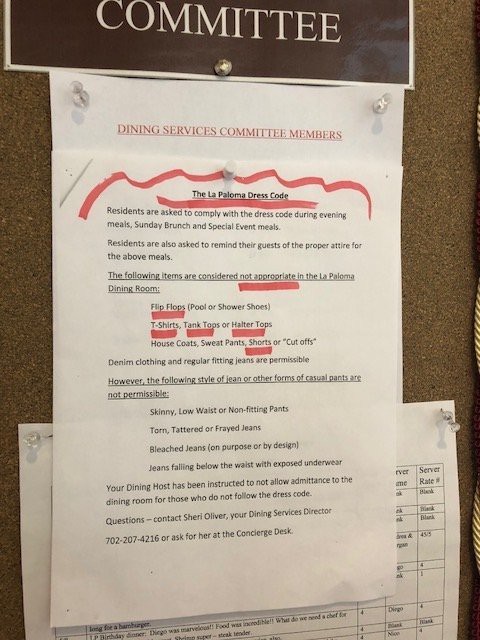 A school announcement with instructions pinned to a bulletin board.