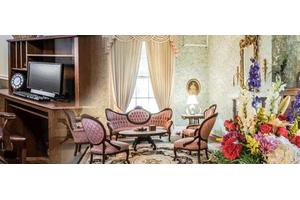 A vintage living room with elegant antique furniture and classic decor.