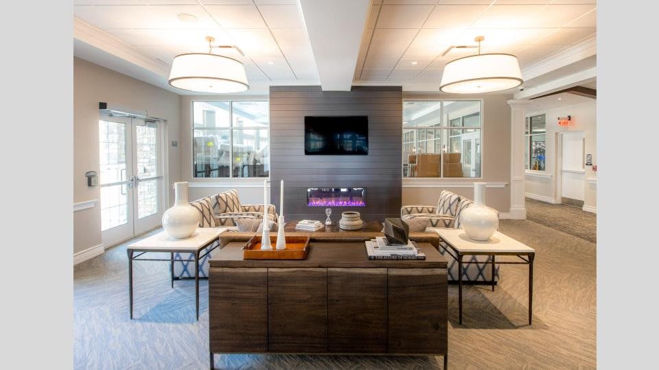 A modern and stylish living room with contemporary furniture and decor.