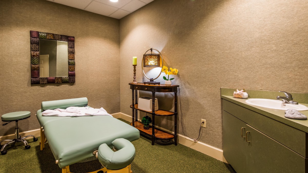 A serene massage room designed for relaxation and wellness.