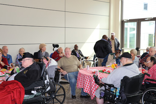 Residents enjoying a social gathering in a community setting.