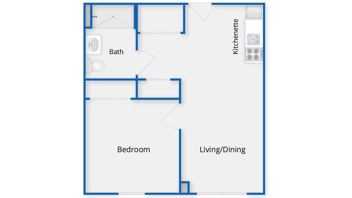 A floor plan of a one-bedroom apartment with a living/dining area, kitchen, and bathroom.